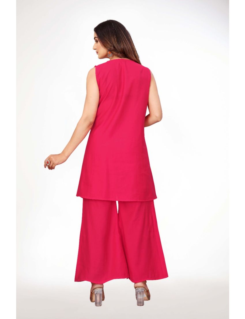 Pink sleeveless top with bell bottom 