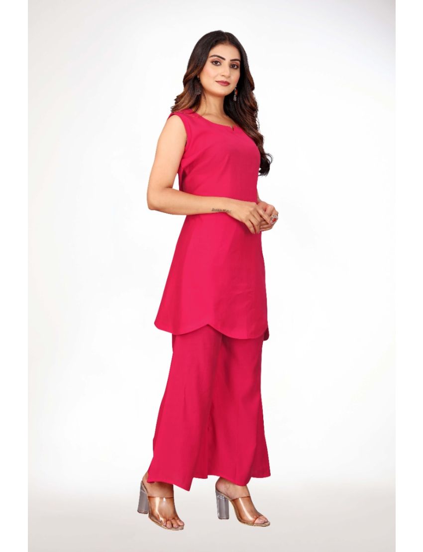 Pink sleeveless top with bell bottom 